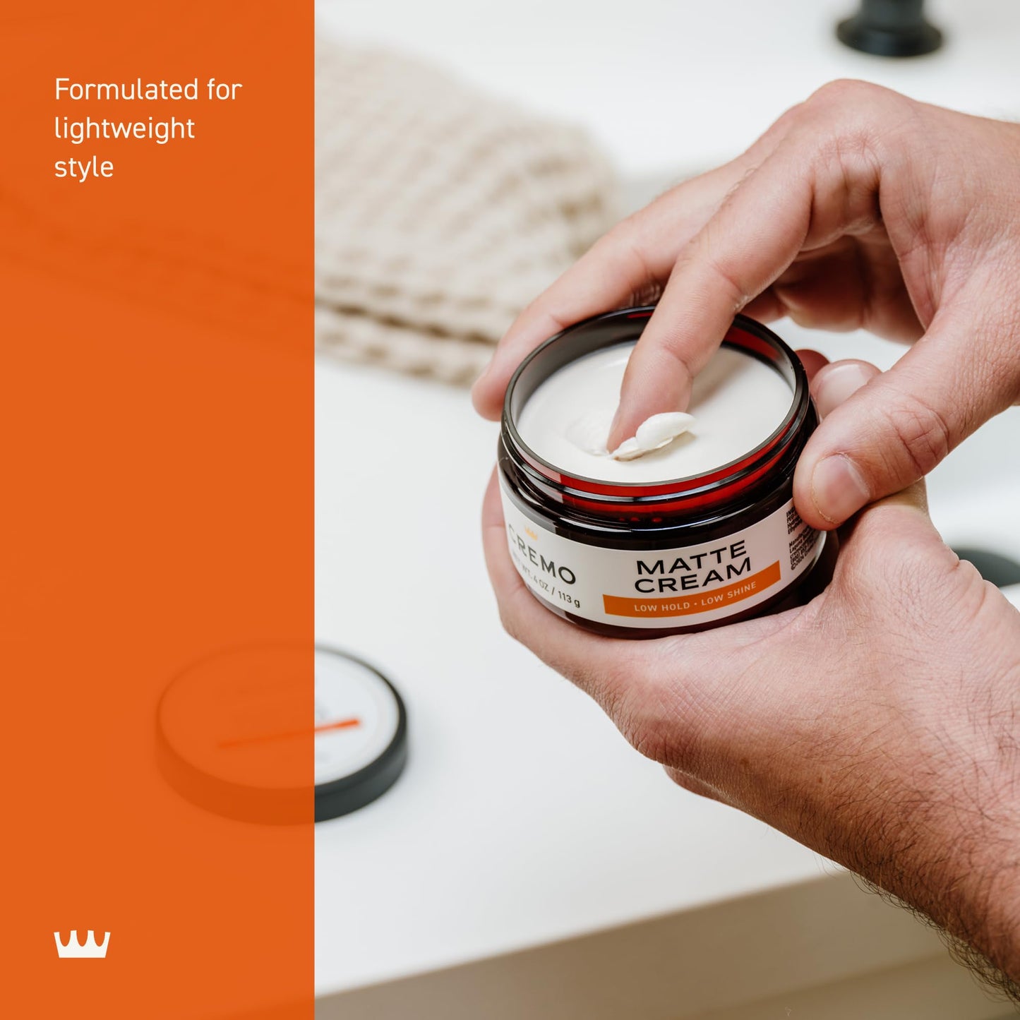 Cremo light hold hair product jar angled perspective