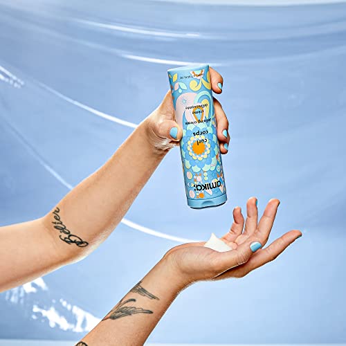 Amika luxury hair care curl enhancer bottle showcasing vibrant floral patterns