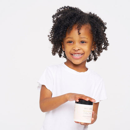 Bask and Lather hair styling cream jar displayed with amaranth and grapeseed oil keywords