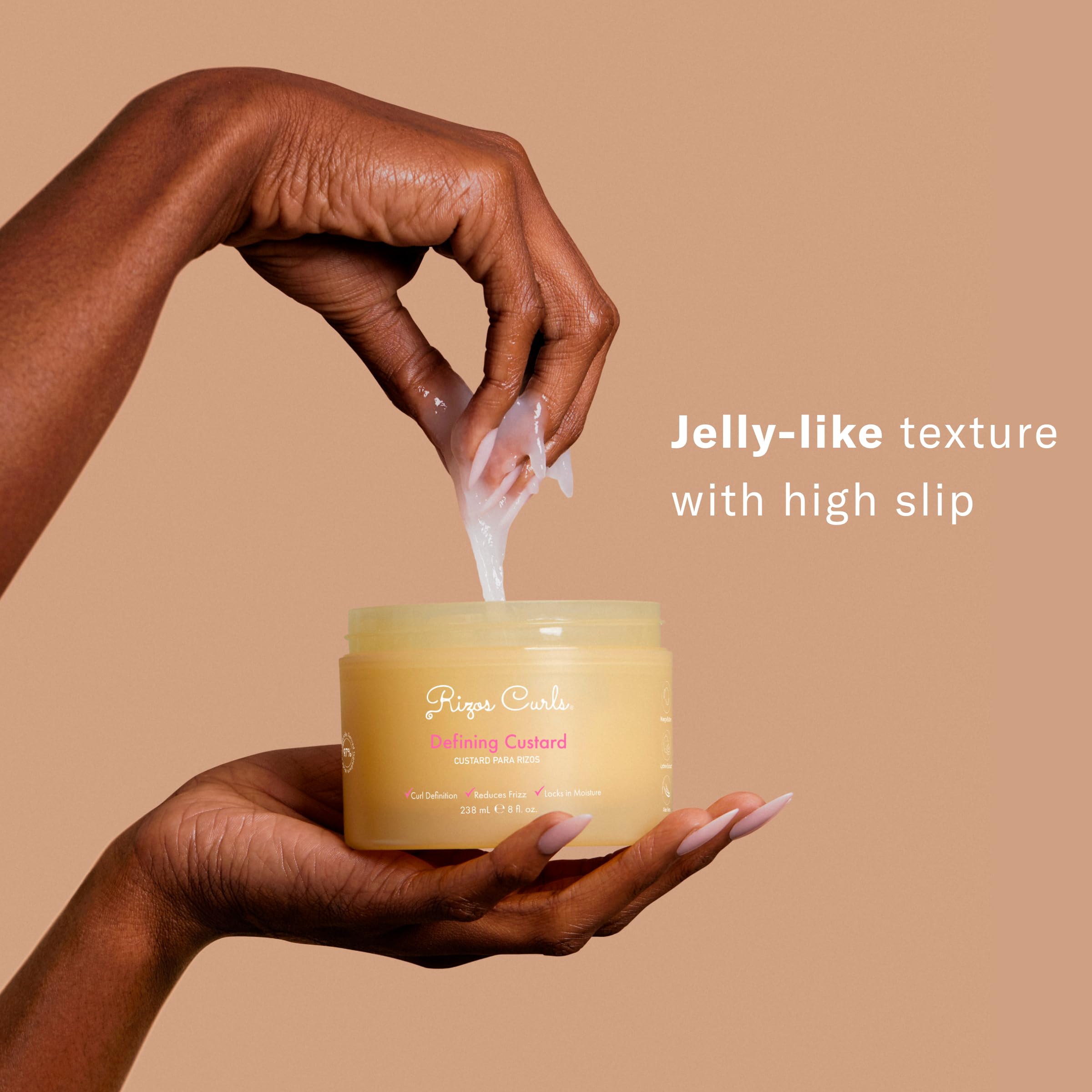 Rizos Curls cream and gel hybrid styling custard texture closeup showing lightweight translucent formula