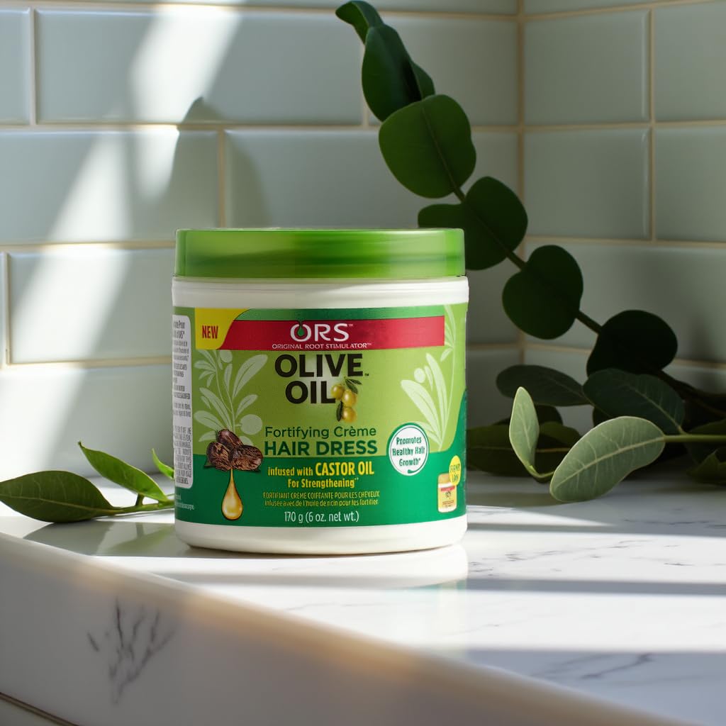 ORS Olive Oil Creme Hair Dress with Castor Oil showing product texture.