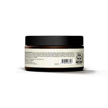 Cremo premium barber grade hair care product top view highlighting the black squeeze cap