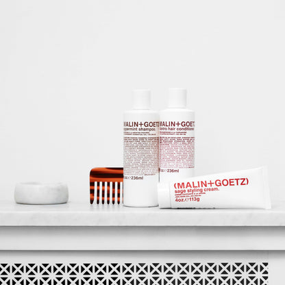 MALIN+GOETZ Sage Styling Cream texture shot of the nourishing hair cream