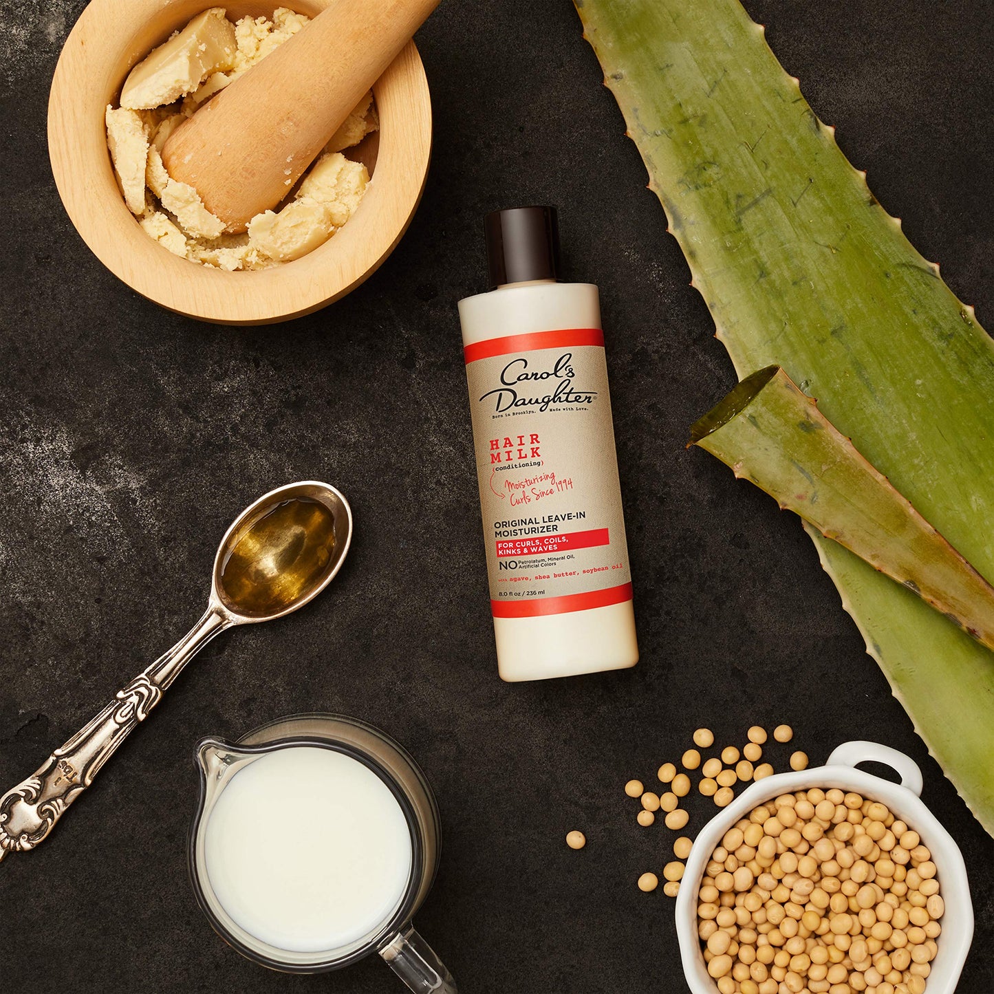 USA imported Carol's Daughter Hair Milk moisturizer for defining natural Indian curly hair.