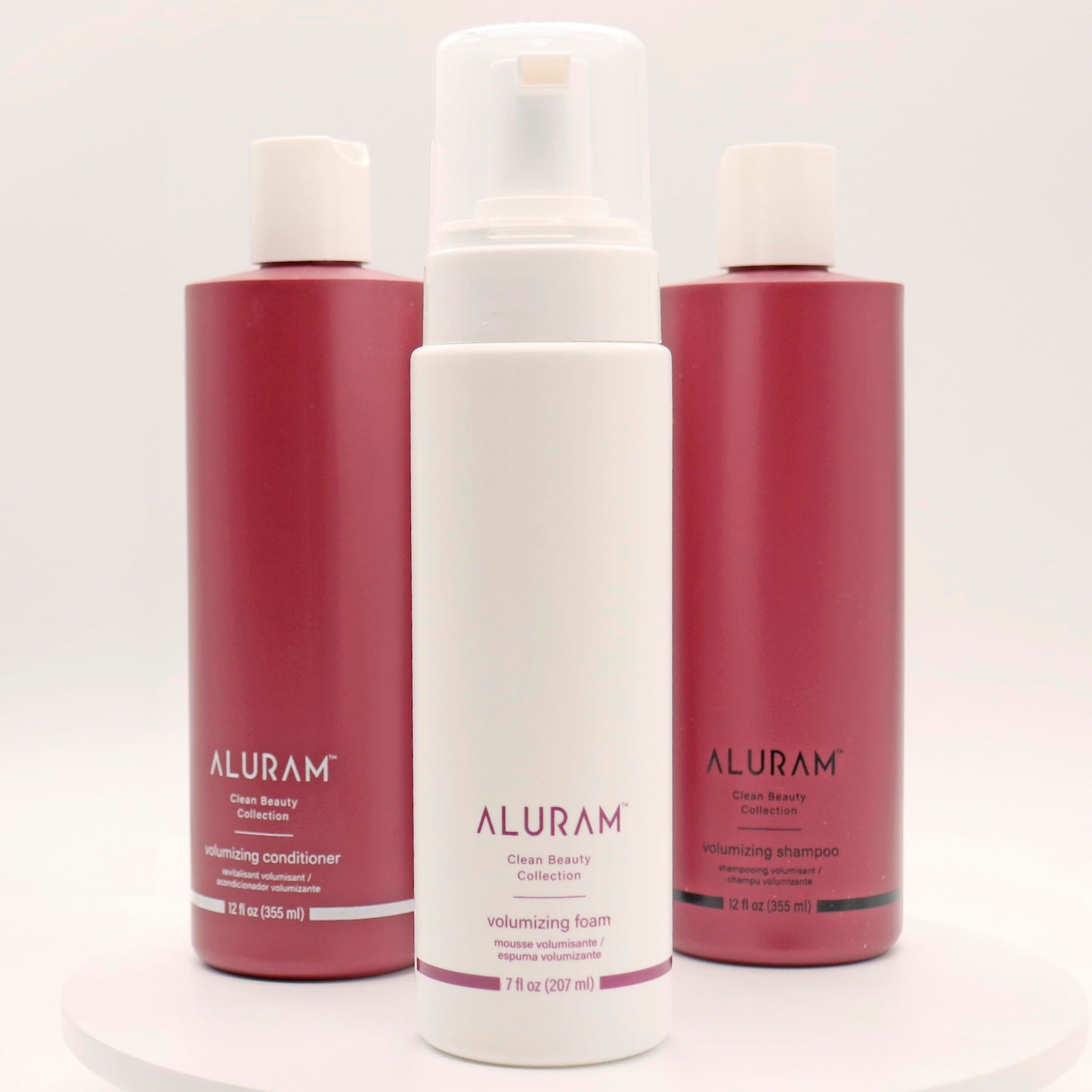 Aluram professional vegan hair mousse packaging showing key clean beauty ingredients