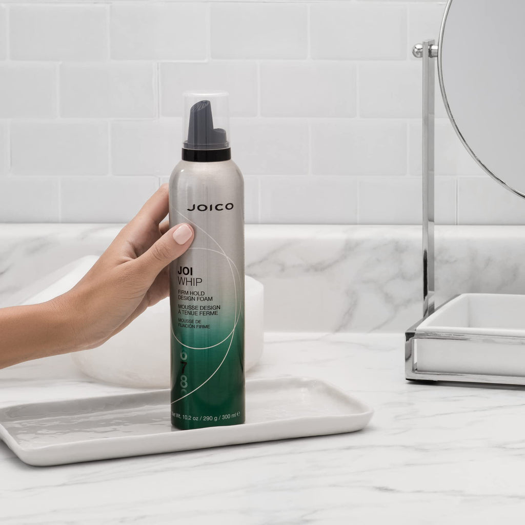 Three hundred milliliter bottle of Joico JoiWhip anti frizz designing foam