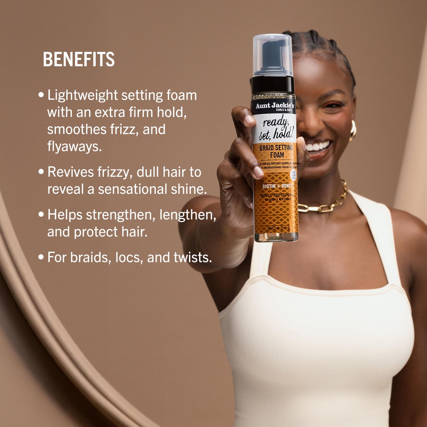 Eight point five fluid ounce bottle of Aunt Jackies braid setting mousse packaging