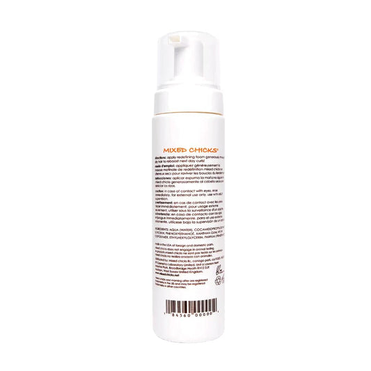 Mixed Chicks styling foam bottle displaying product ingredients and usage directions