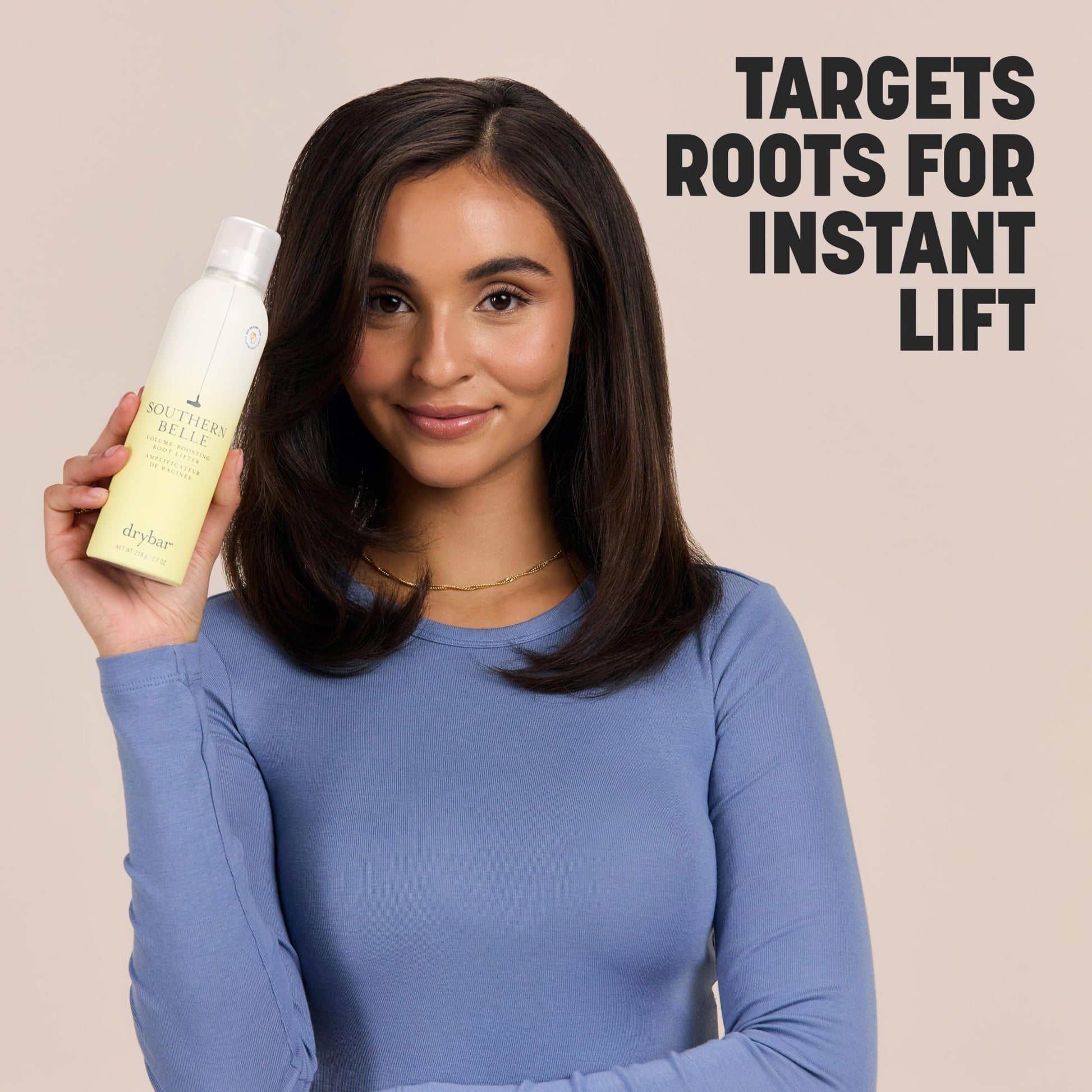 Drybar Southern Belle hair styling spray foam bottle angled view