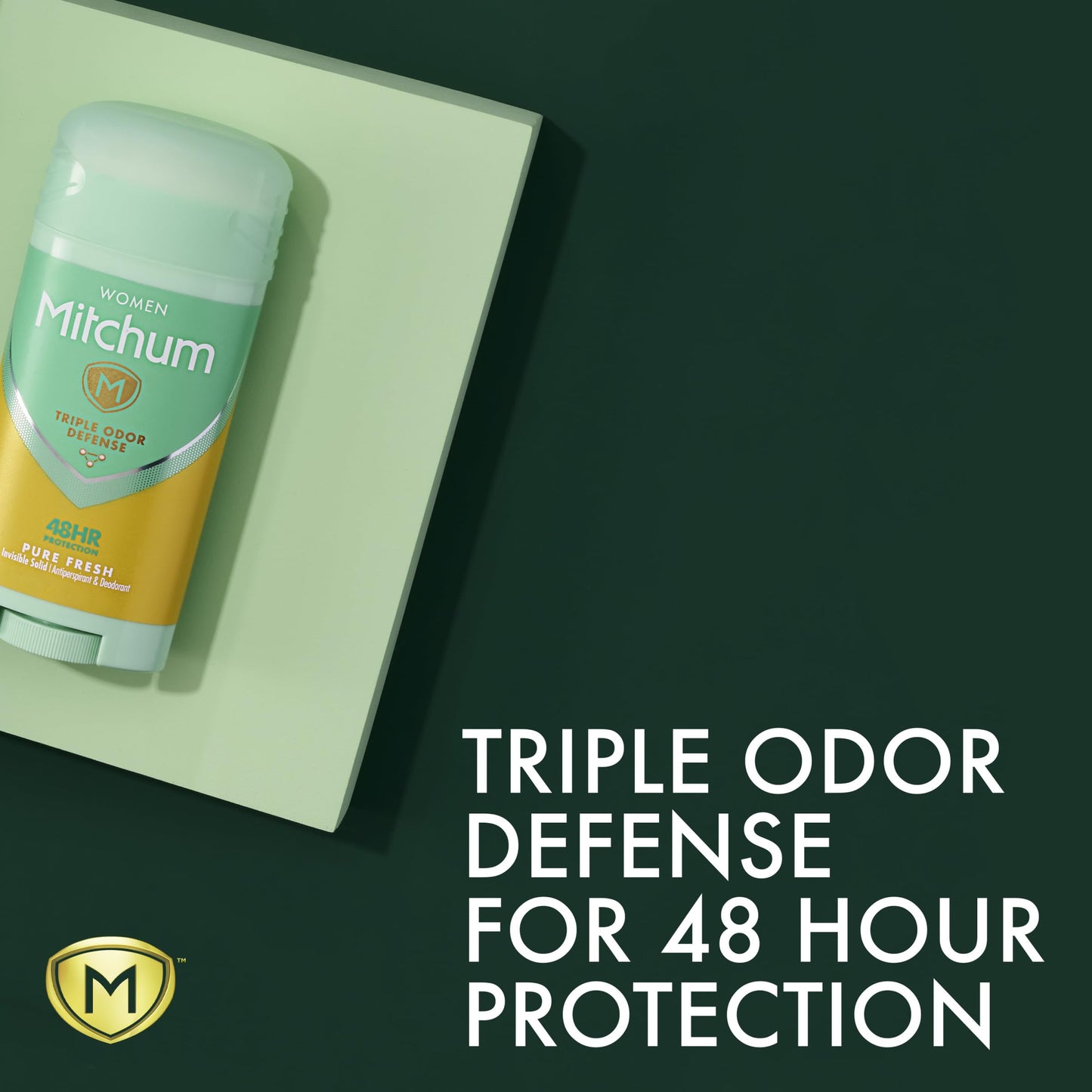 Mitchum Women Invisible Solid Pure Fresh deodorant cap removed showing the smooth antiperspirant surface.