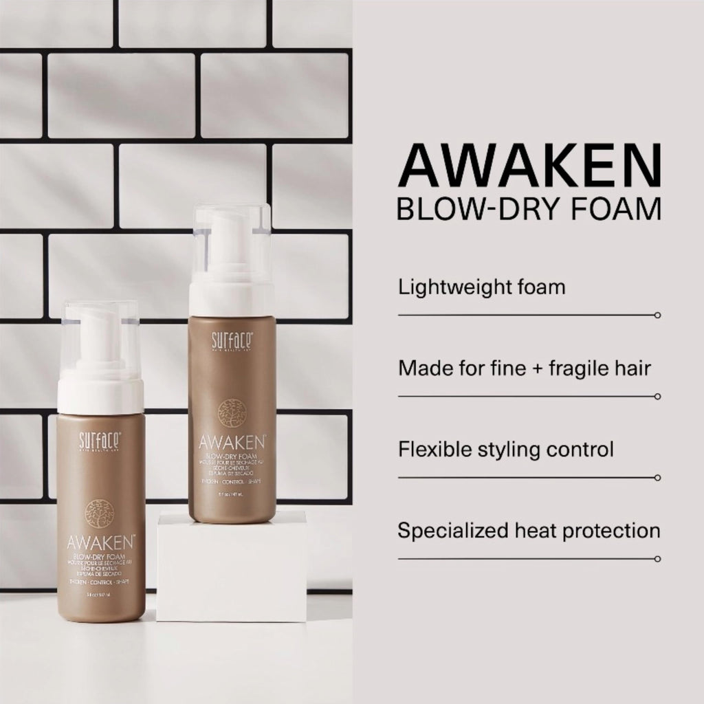 Surface Awaken salon styling mousse bottle showcasing clean botanical ingredients
