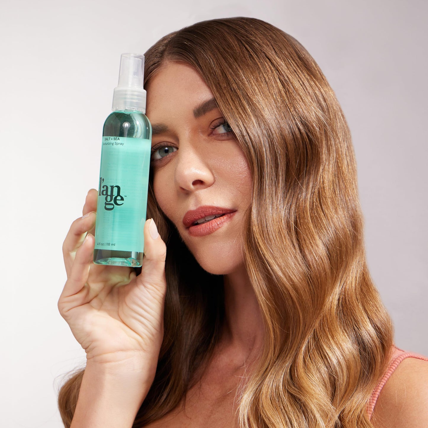 Authentic L'ange Hair marine botanical infused sea salt texturizing spray for modern styling