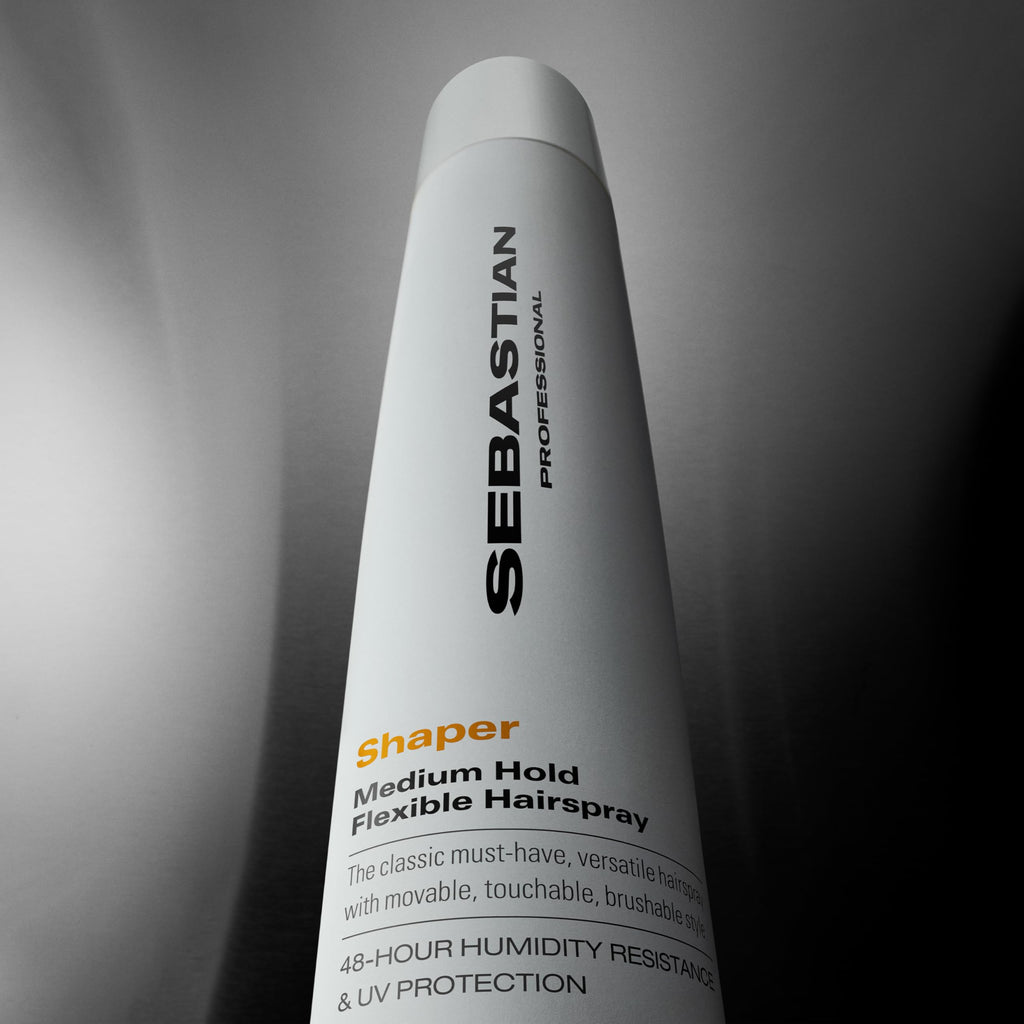 Full range view of Sebastian Professional hair styling spray bottle for frizz control