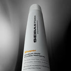 Full range view of Sebastian Professional hair styling spray bottle for frizz control