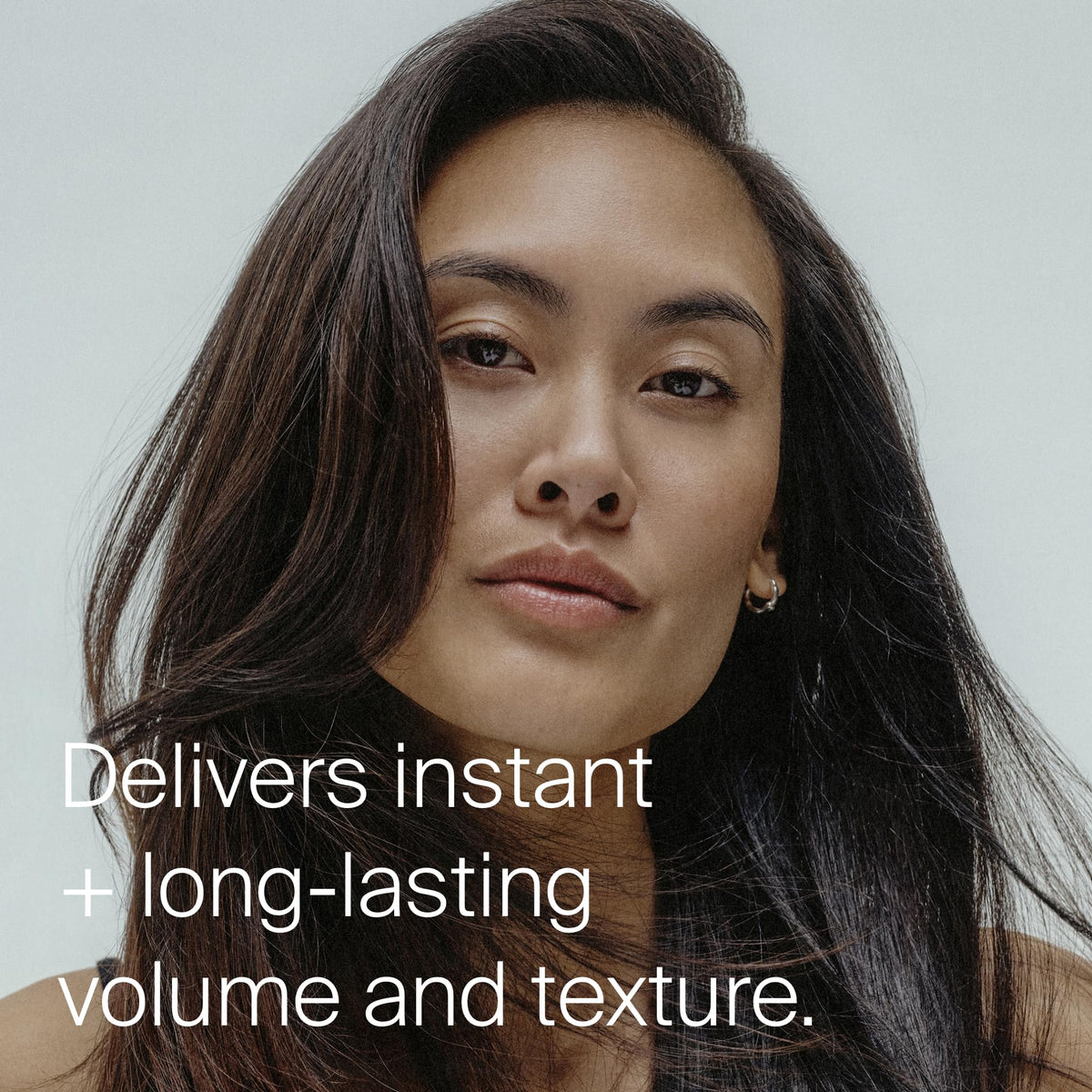 Living Proof texturizing spray aerosol canister for adding instant volume to fine hair.