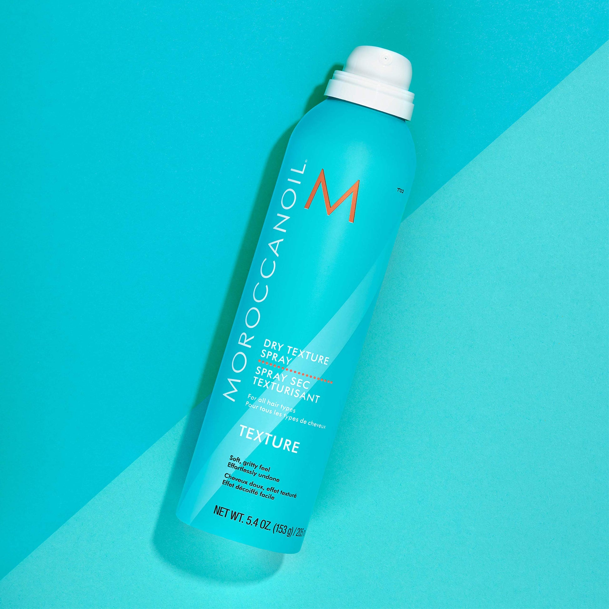 Moroccanoil dry finish spray showcasing signature branding and ingredients