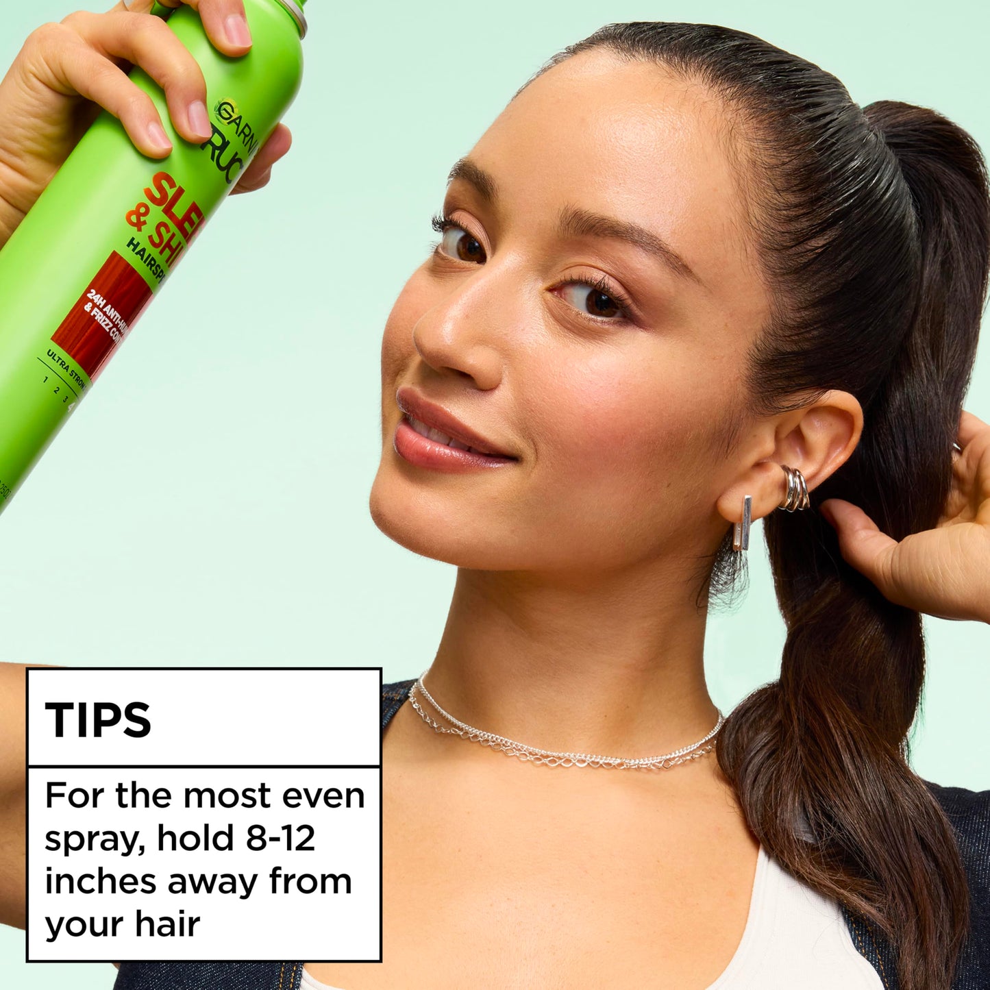 Garnier Fructis hairspray can for smoothing flyaways and securing updos