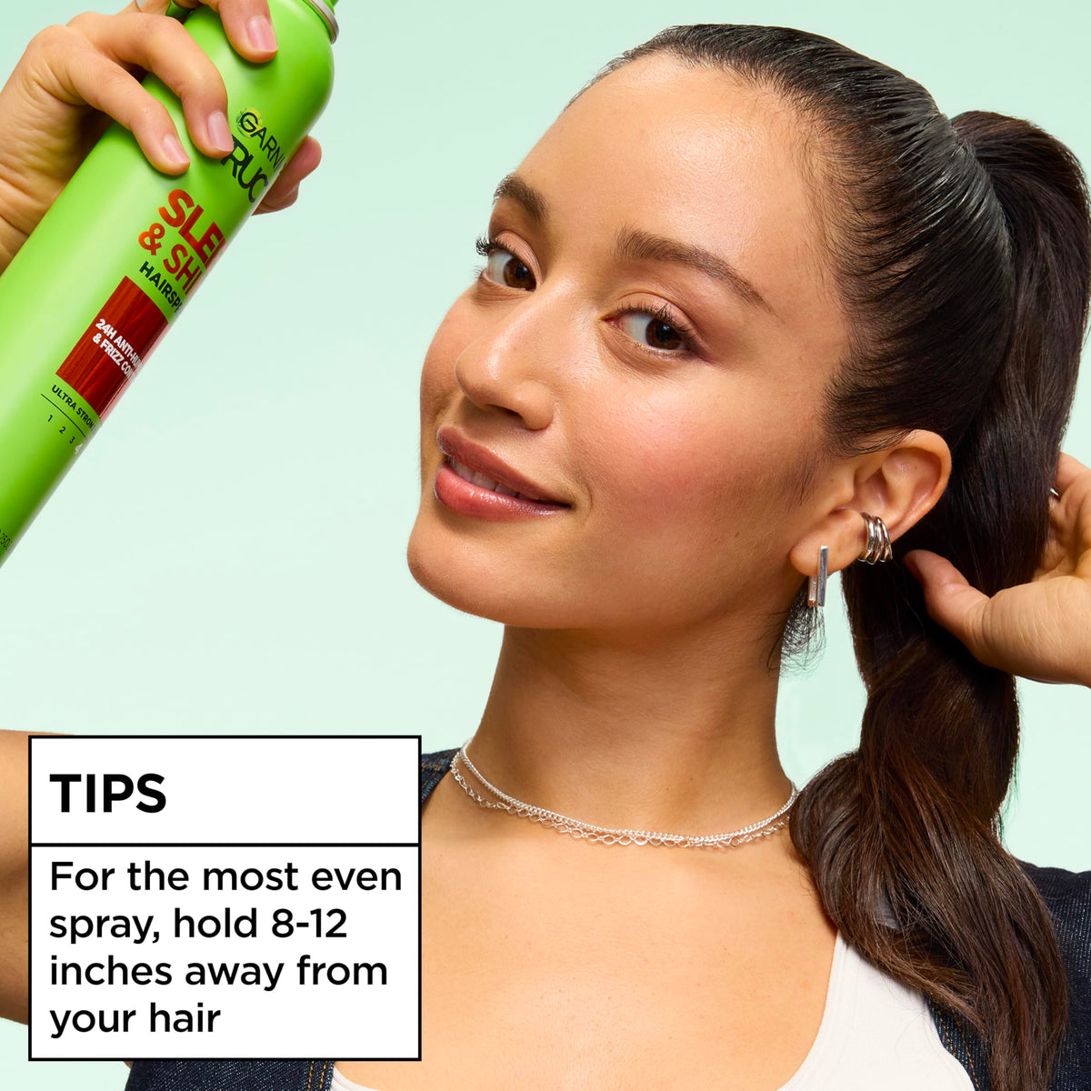 Garnier Fructis hairspray can for smoothing flyaways and securing updos