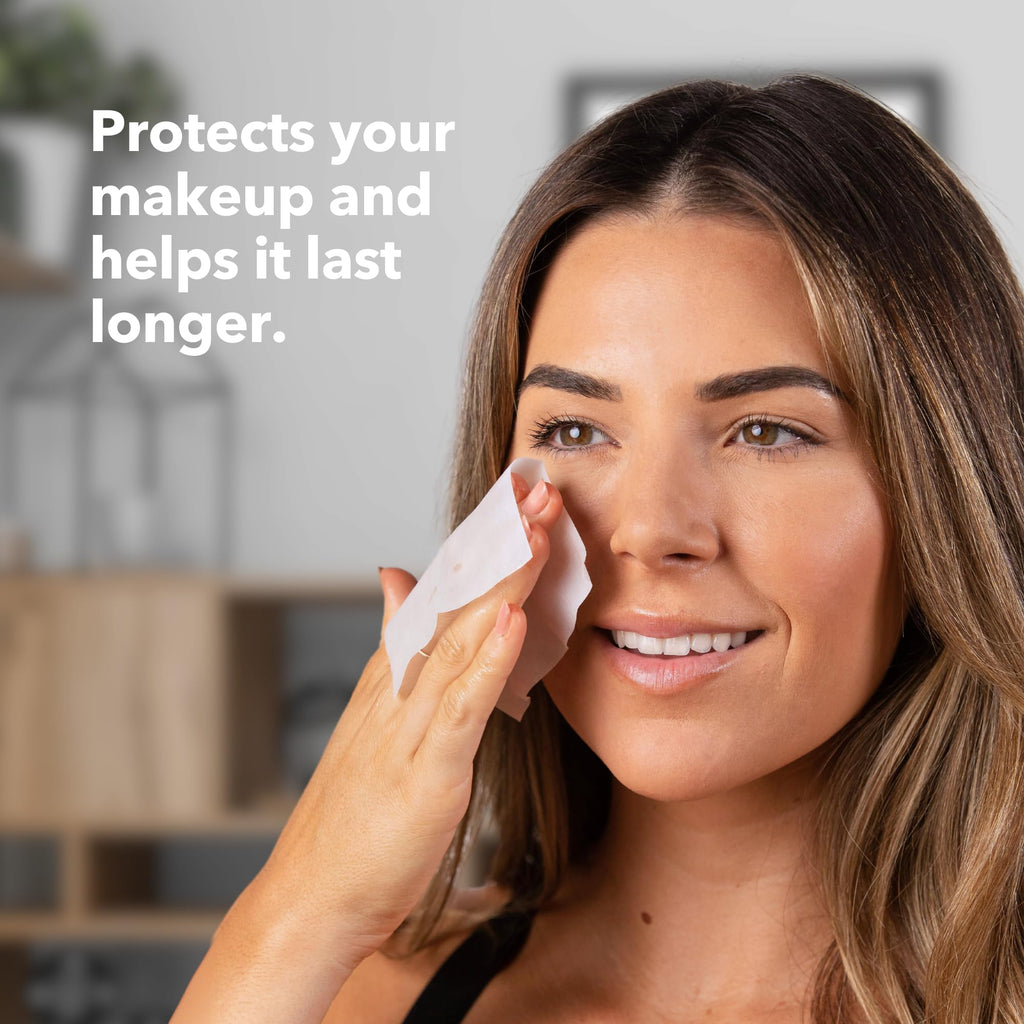 Model demonstrating facial application of SweatBlock wipes