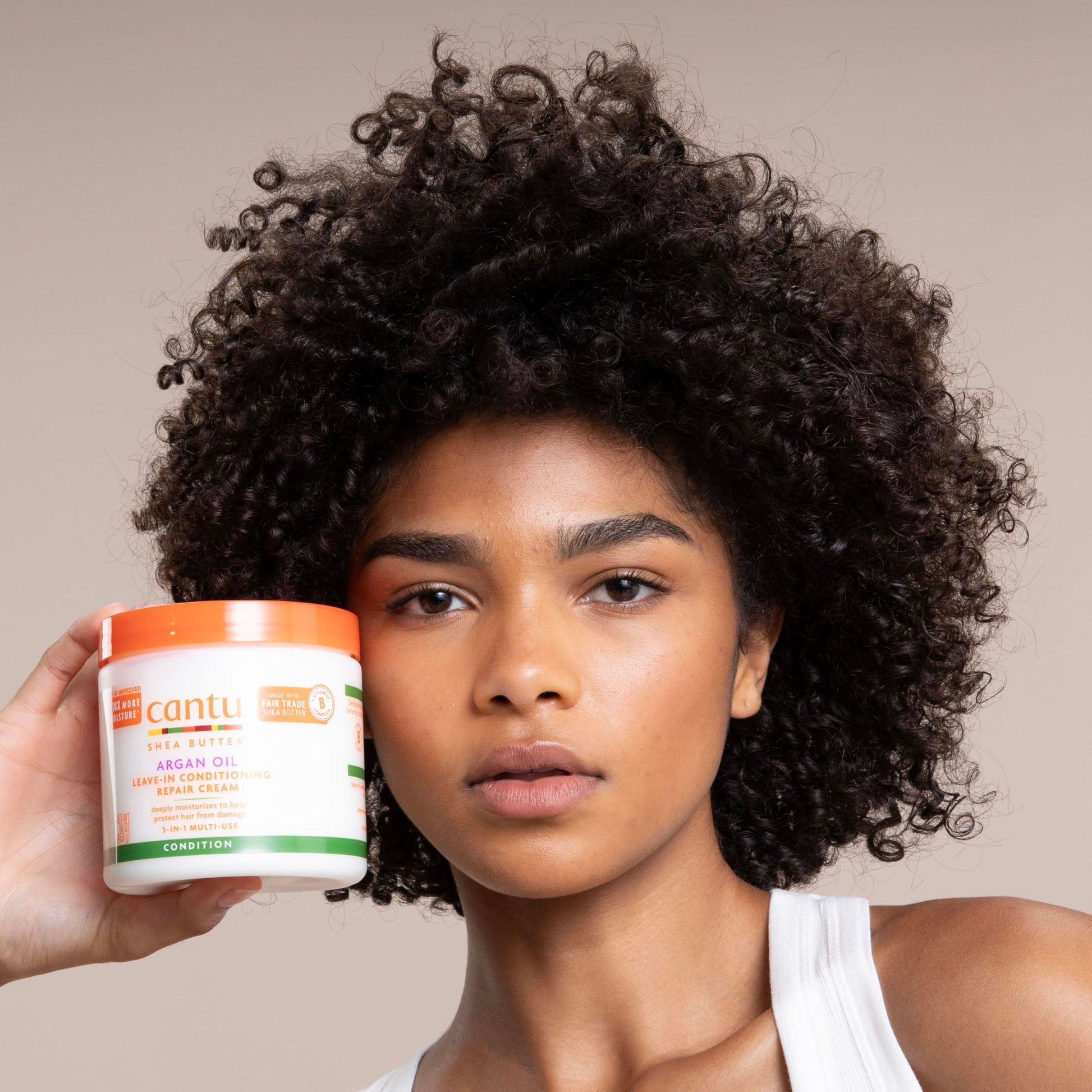 Cantu argan oil hair repair treatment jar opening