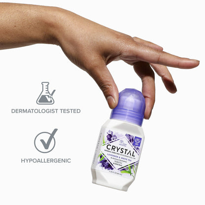 Crystal Essence liquid mineral deodorant roll on standing upright on a white surface
