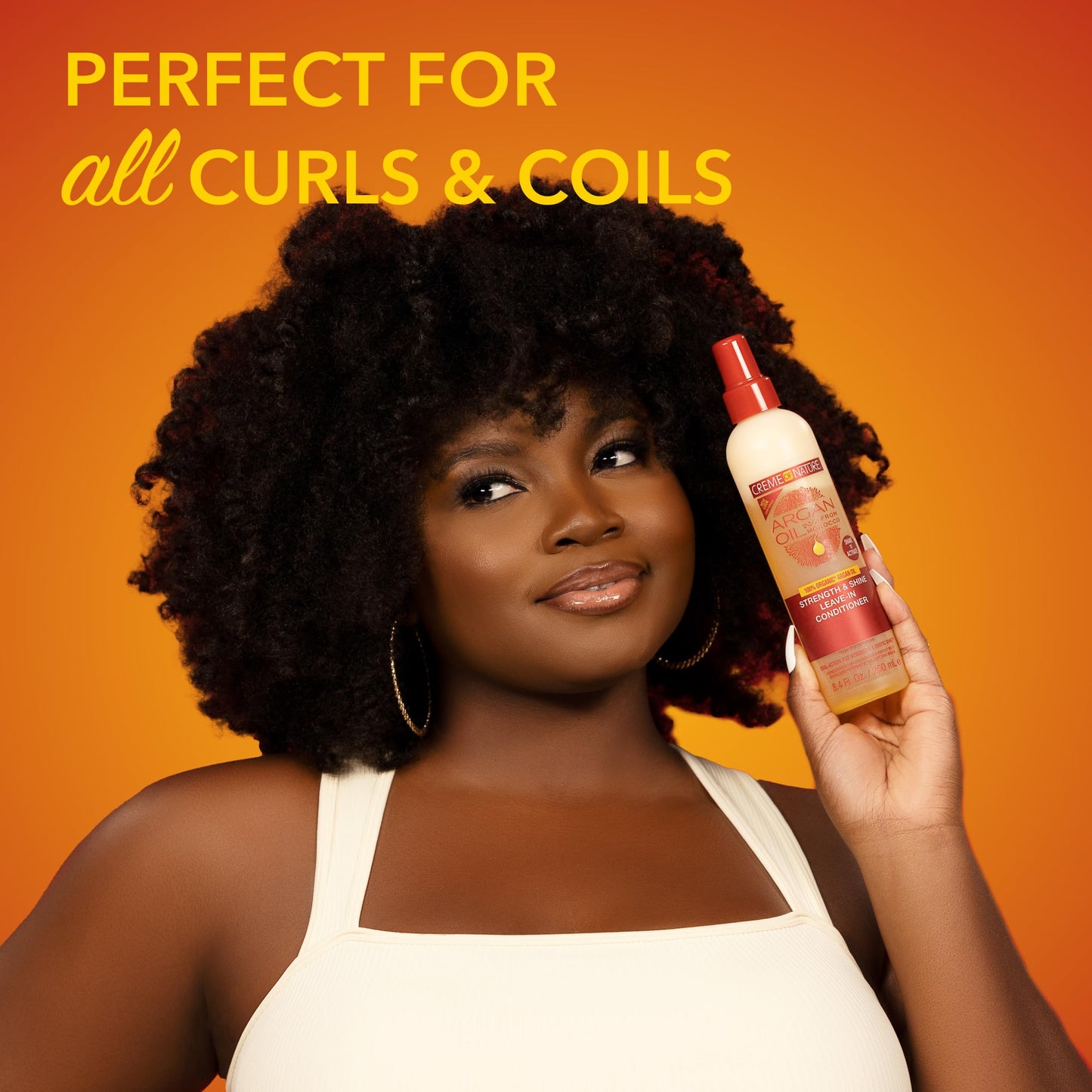 Lightweight frizz control mist by Creme of Nature for heat protection styling