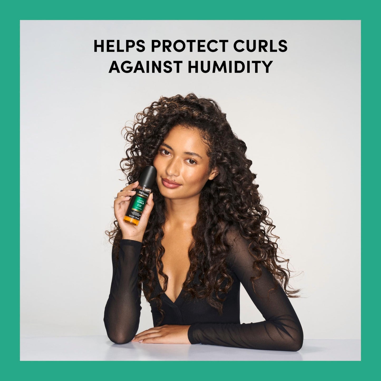 Tresemme hair styling mist for frizz protection in 3.3 fluid ounce size