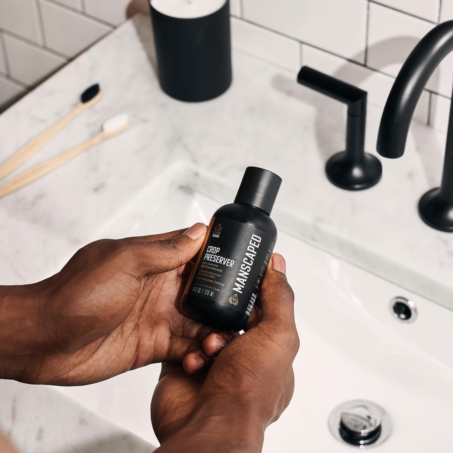 MANSCAPED talcum free ball deodorant cream application on palms