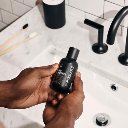 MANSCAPED talcum free ball deodorant cream application on palms