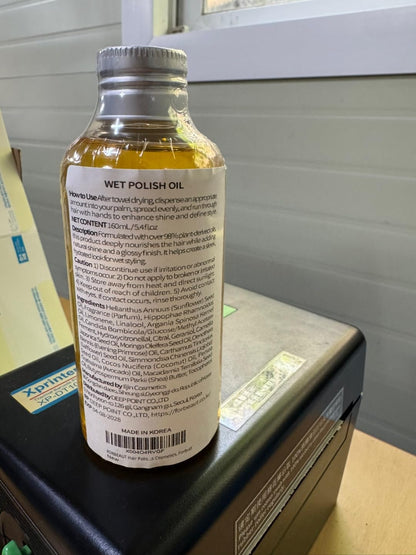 Forbeaut Wet Hair Polish Oil 160ml bottle unboxed on a reflective surface.