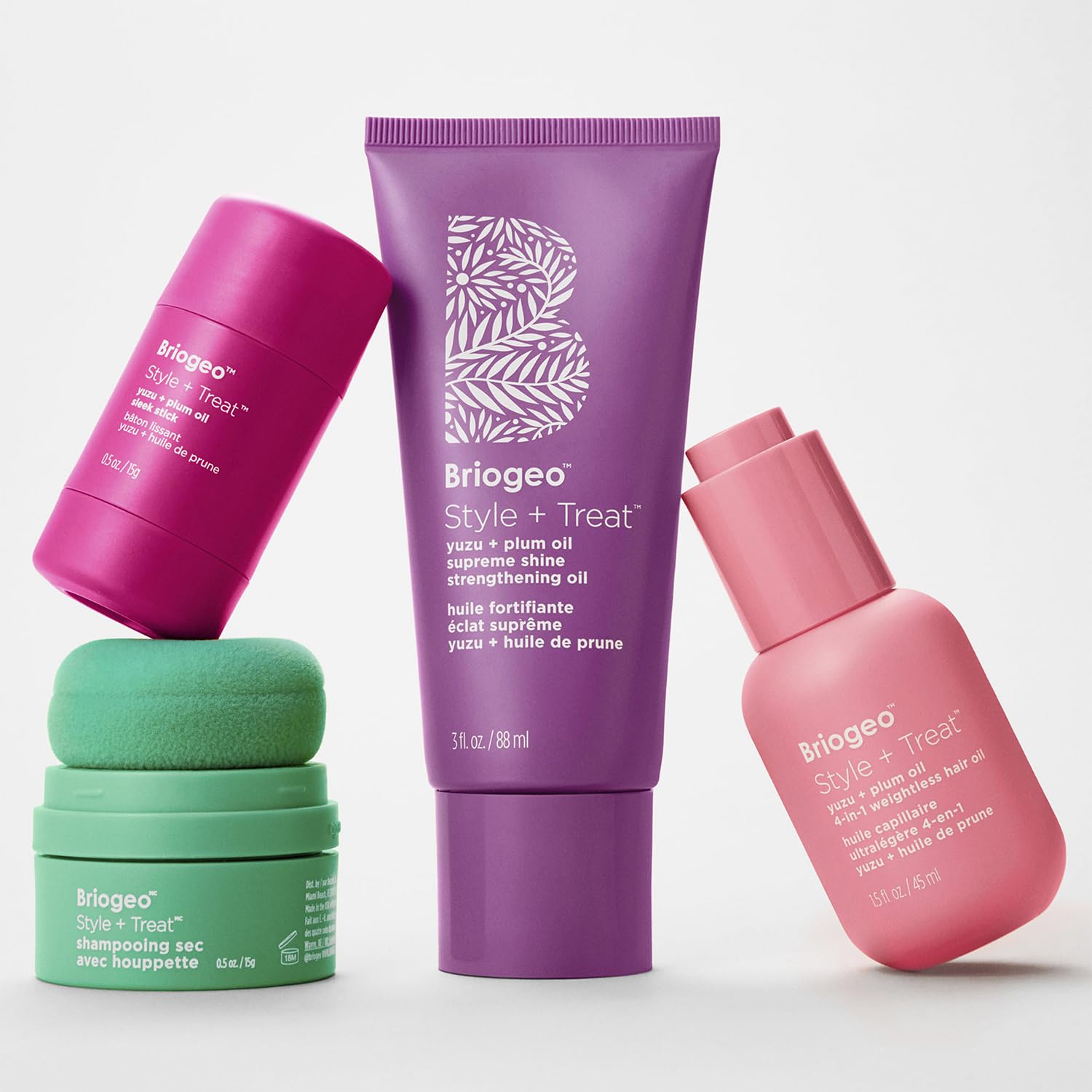 Briogeo yuzu and plum supreme shine oil package layout on clean background.