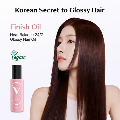 Vodana Korean beauty non sticky watery hair oil bottle on a minimalist background