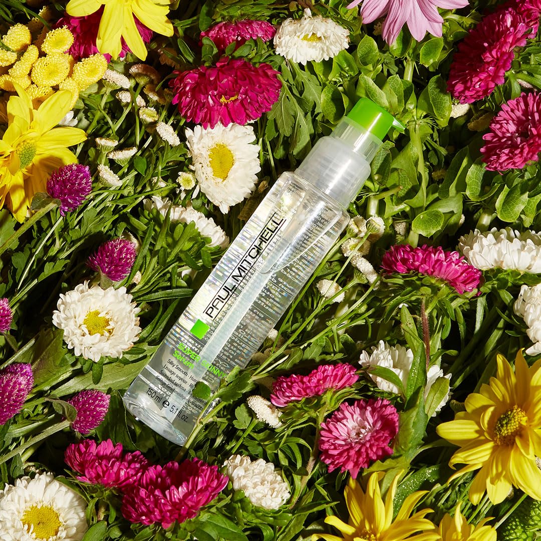 Side view of Paul Mitchell Super Skinny Serum bottle highlighting humidity resistant properties for frizzy hair