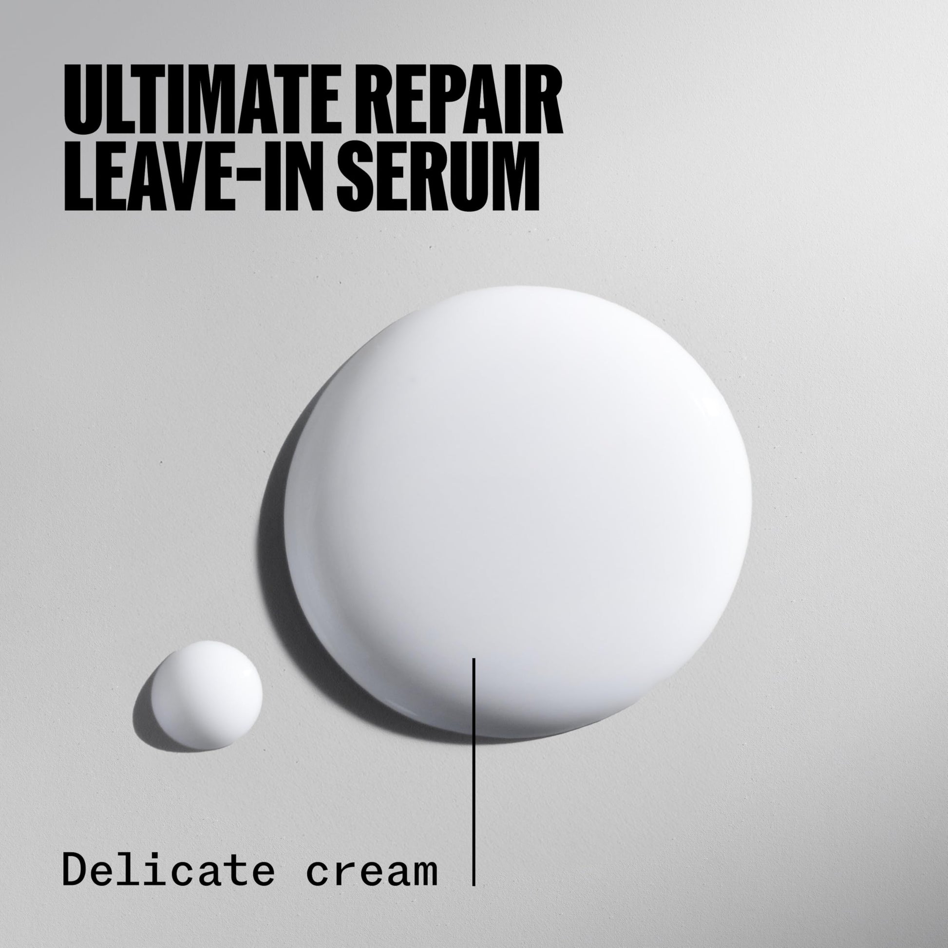 Wella Ultimate Repair cream texture on fingertips showing lightweight consistency