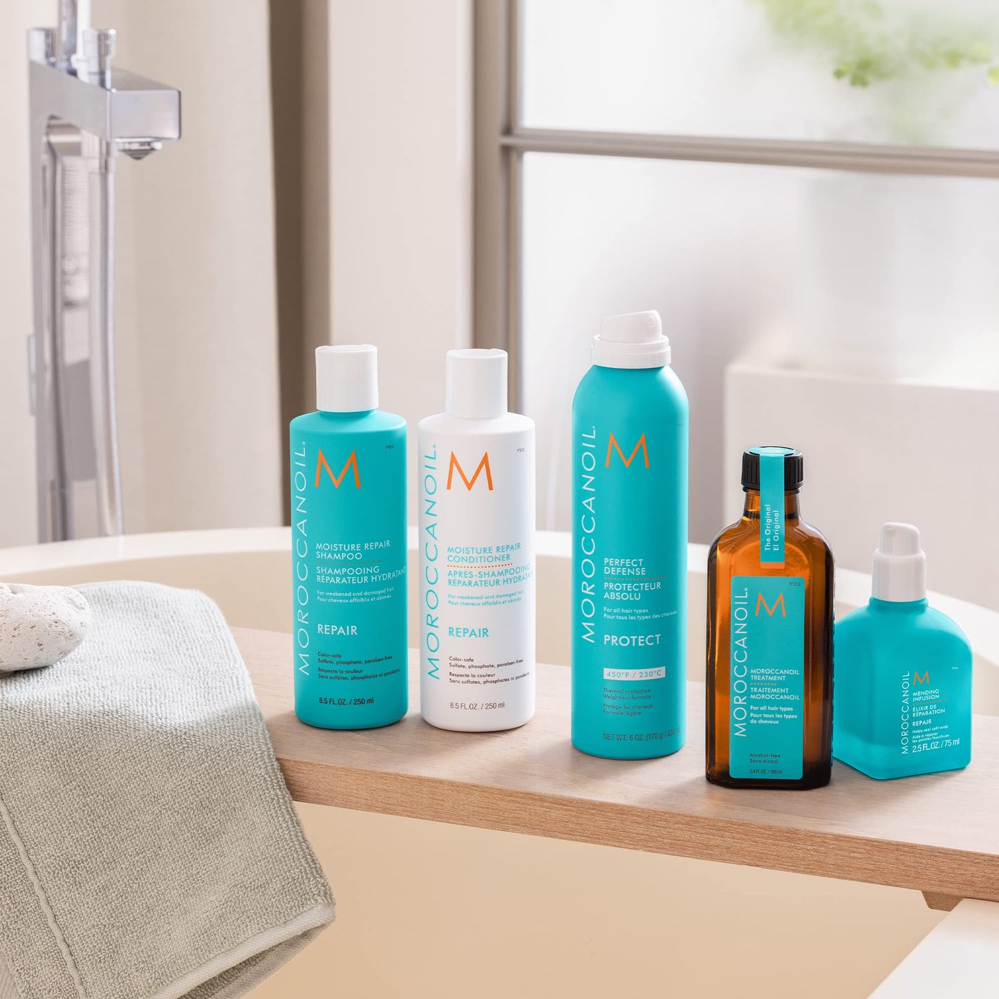 Moroccanoil Mending Infusion luxury split end finisher bottle side view
