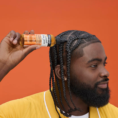 Aunt Jackie's Curls and Coils scalp treatment for protective hairstyle maintenance