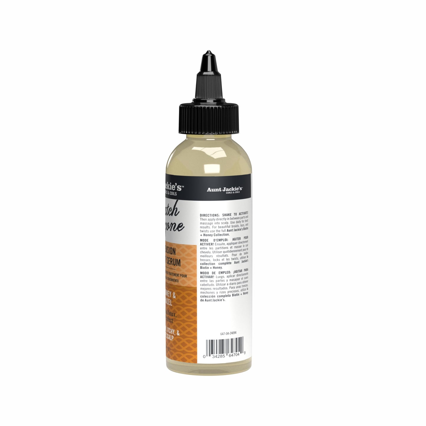 Aunt Jackie's Scratch Free Zone bottle being held showing size comparison