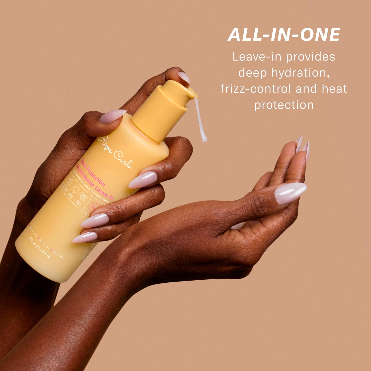 Rizos Curls thermal protectant lotion pump dispenser close up view
