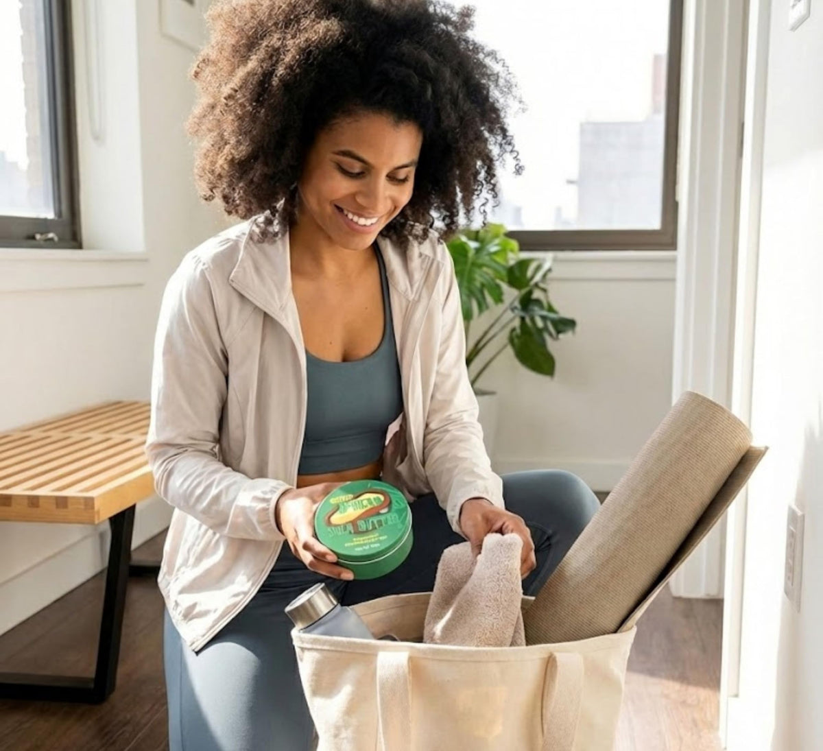 Lifestyle shot of Nimba Foods Whipped Shea Butter on a wooden surface