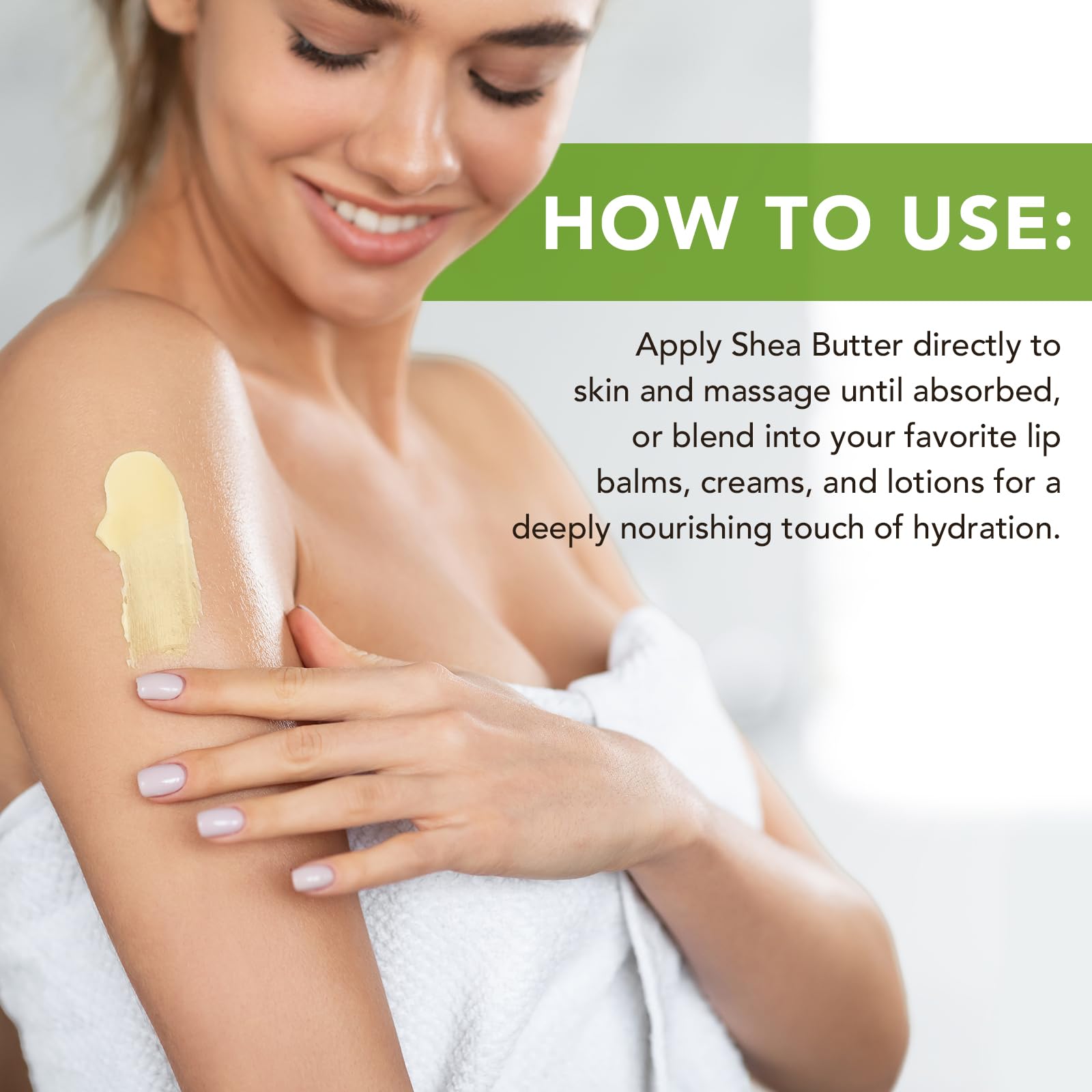 Raw shea butter being applied to dry hands