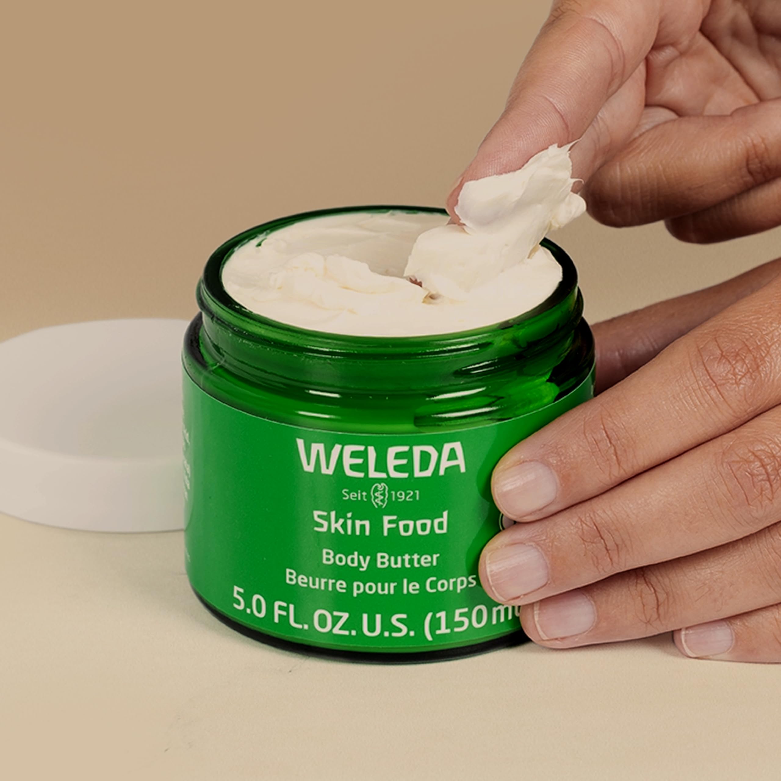 Weleda Skin Food Body Butter whipped texture demonstration