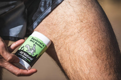 Applying anti chafing stick to thigh area