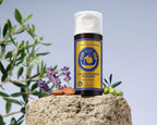 Side view of Ancient Greek Remedy face moisturizer bottle showing product size