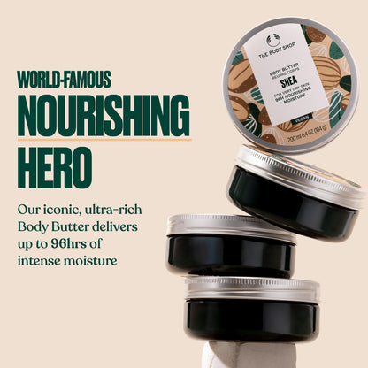 Open jar of The Body Shop shea body butter showing rich texture