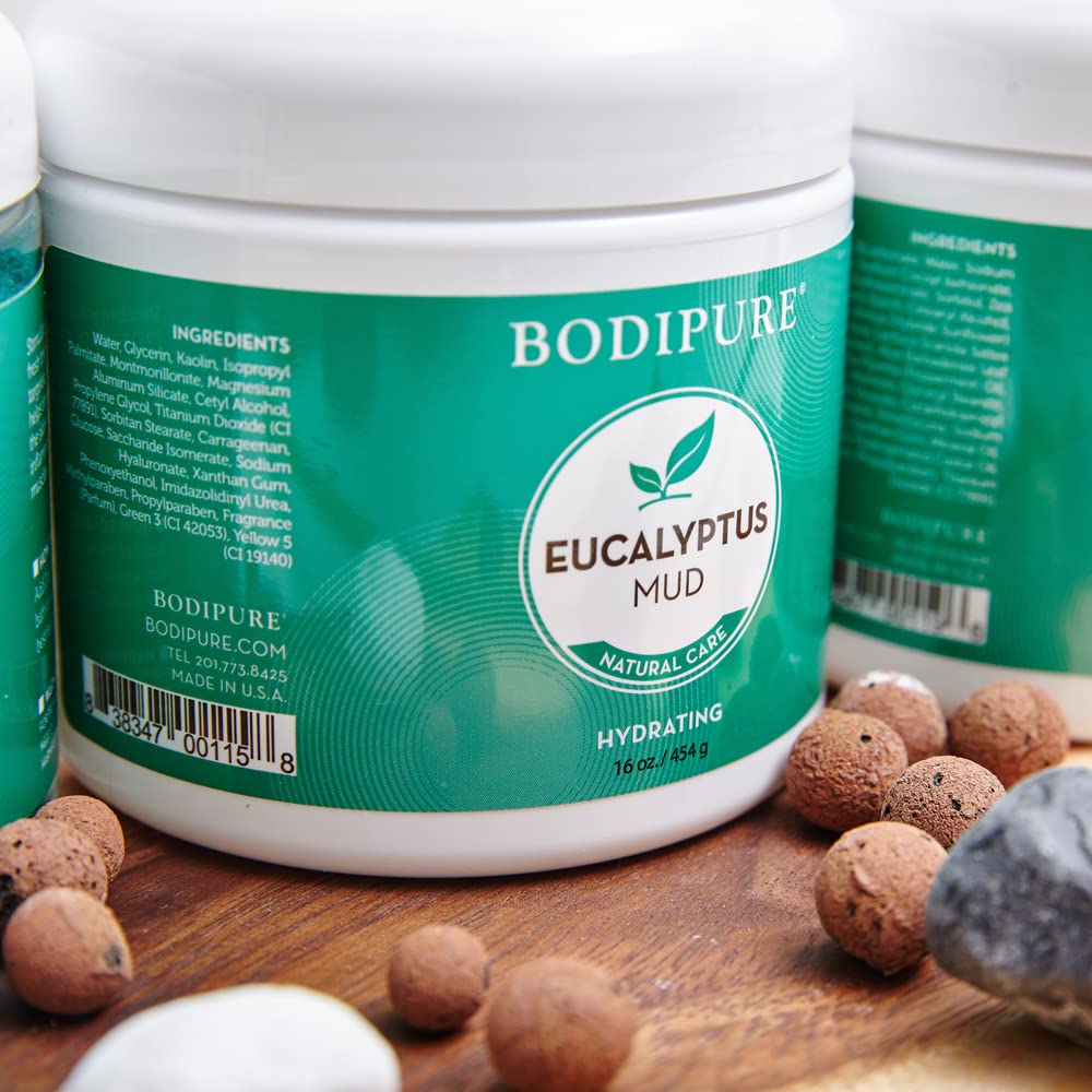 Spa quality moisturizing body mud mask by Bodipure displaying product weight and usage benefits