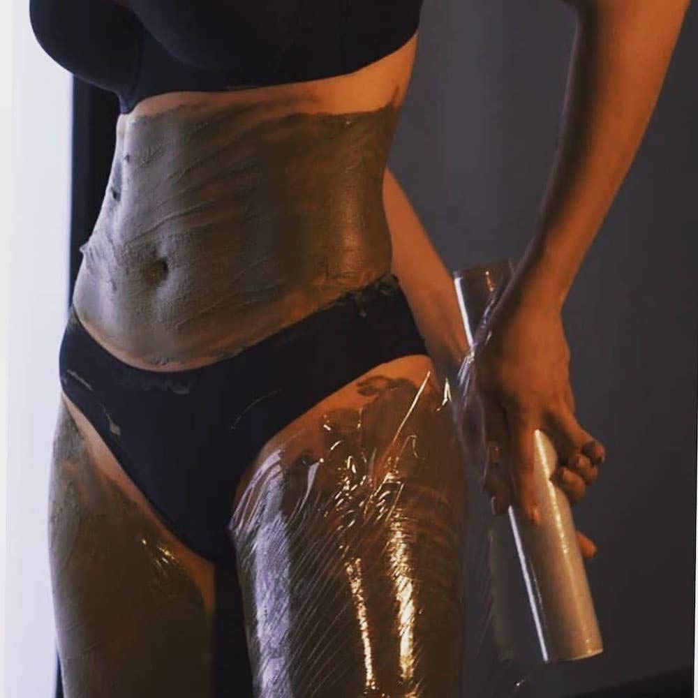 Guam body wrap packaging highlighting the hot formula effect for lower body fat reduction.