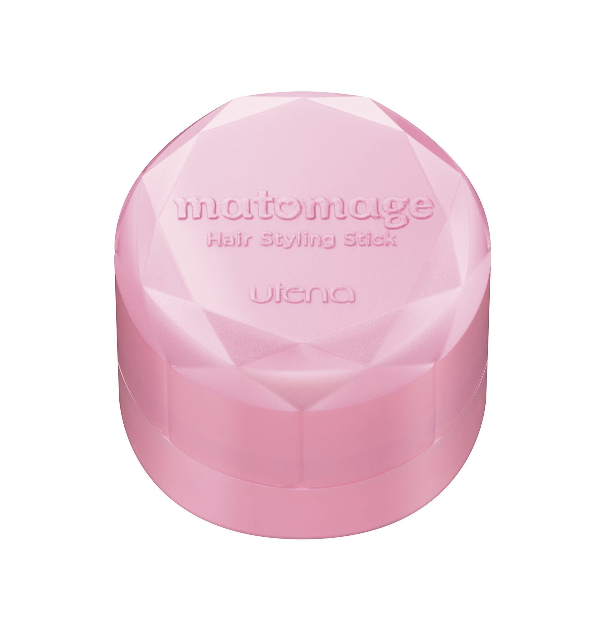 Top down view of the Utena Matomage thirteen grams styling stick showing the wax texture