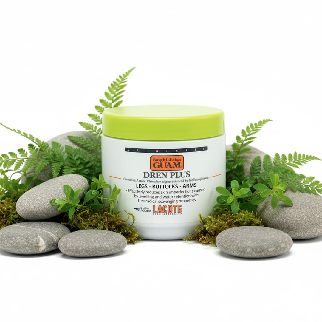 Applying Guam seaweed mud wrap onto thighs for cellulite reduction
