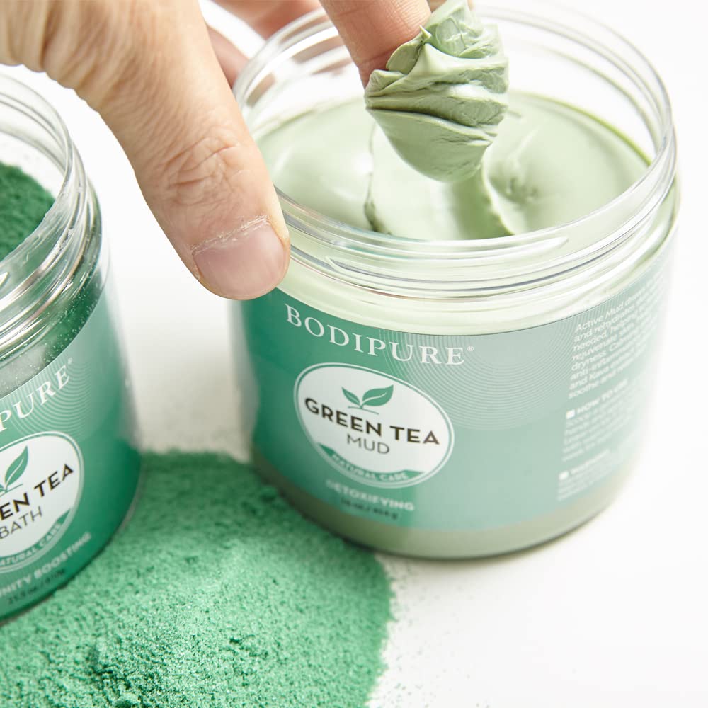 Authentic USA imported green tea body clay treatment in a large round container.