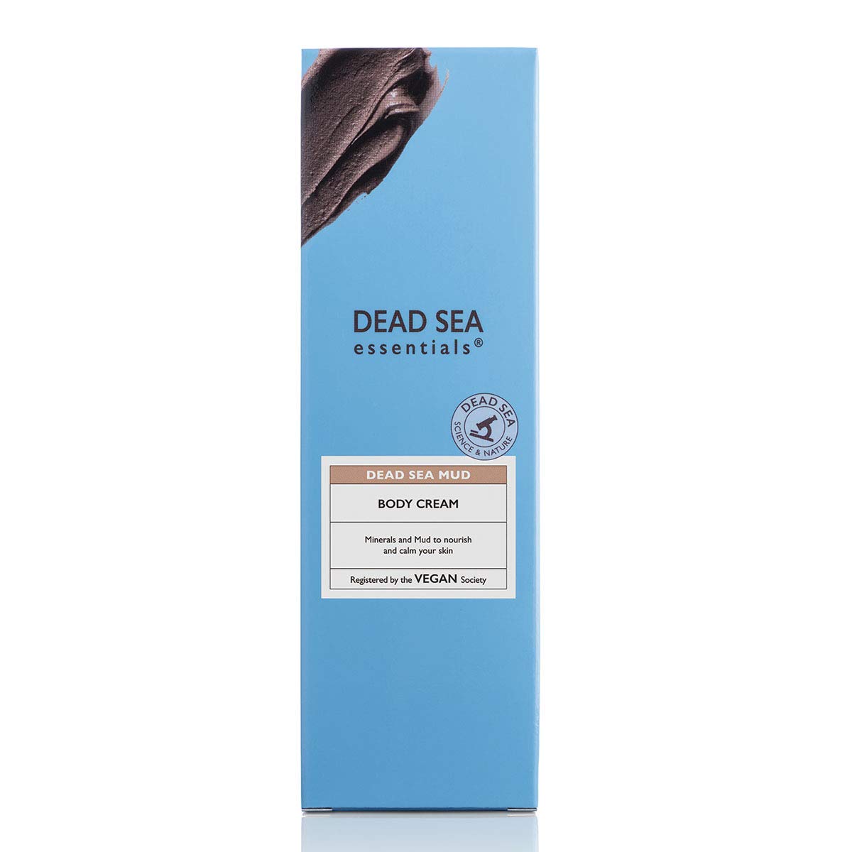 Application of mineral-rich body cream on dry skin